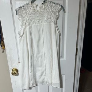 white dress with crochet lace neckline